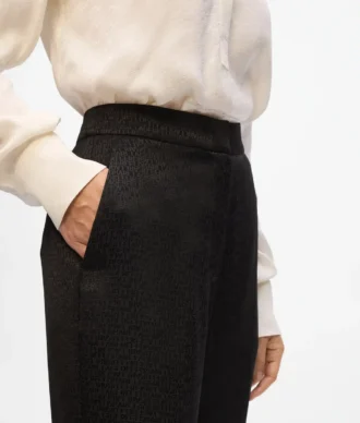 Pantaloni cu imprimeu integral