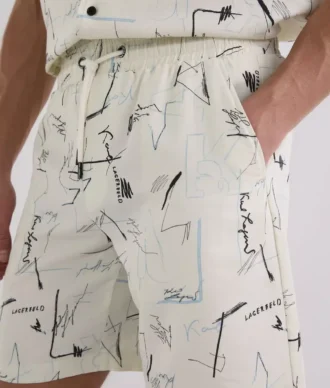 PANTALONI SCURȚI CU IMPRIMARE ALL-OVER